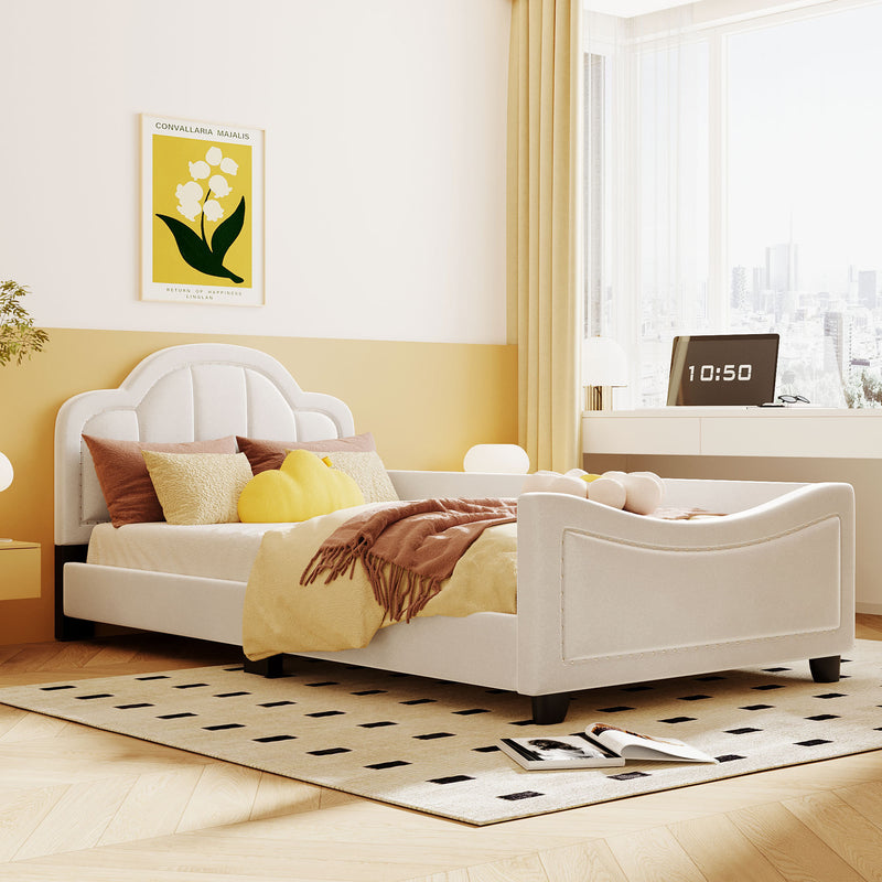 Twin Size Upholstered Daybed with Cloud Shaped Headboard, Embedded Elegant Copper Nail Design, Beige